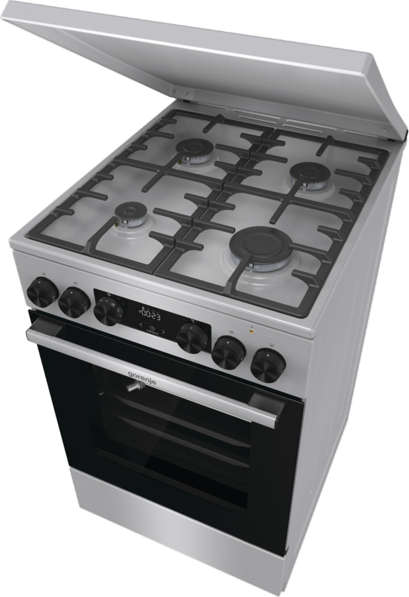 Srebrno-czarna kuchenka gazowa Gorenje z otwartą pokrywą i drzwiami piekarnika.