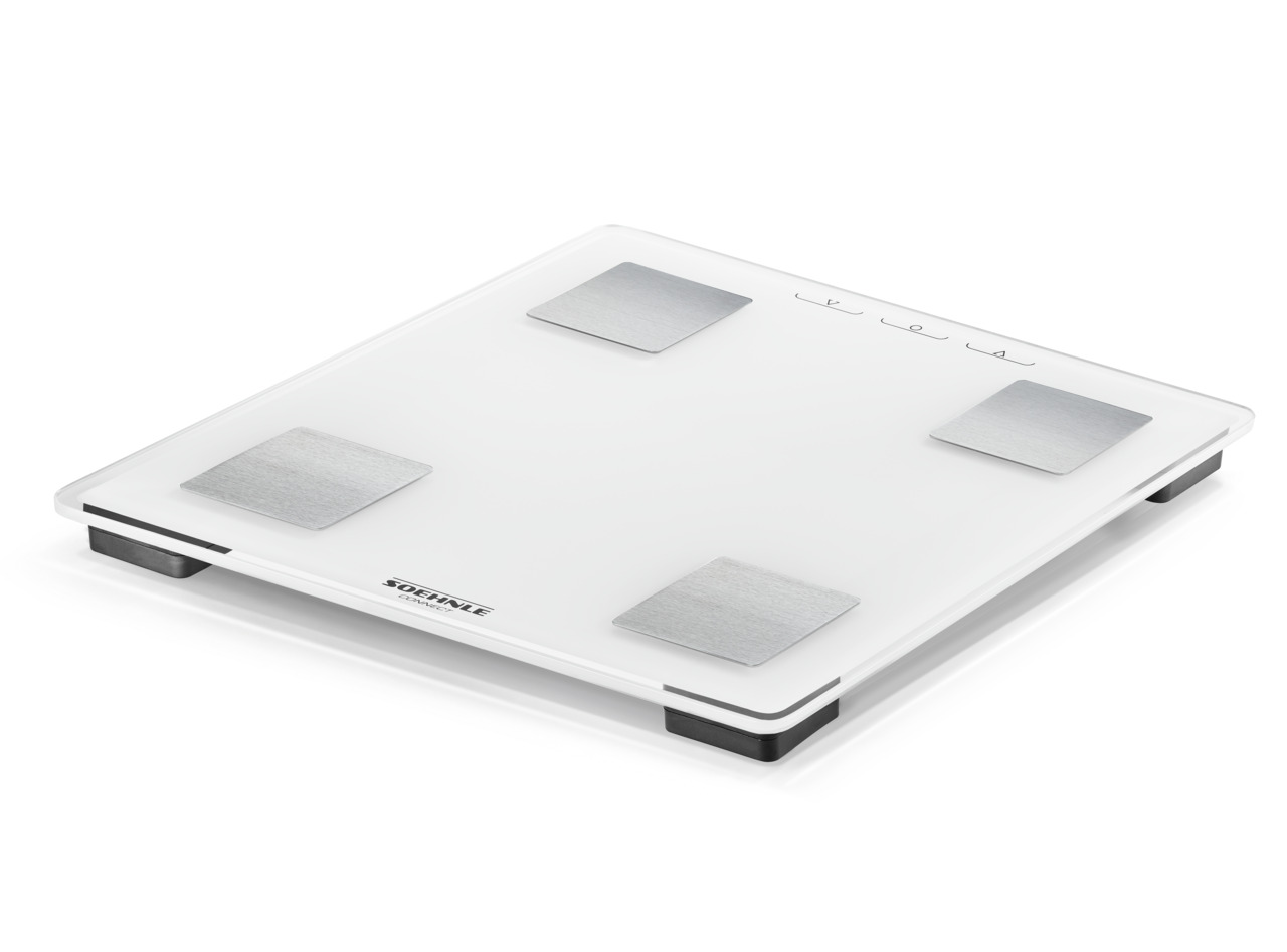 Eine weiße Körperwaage. Die Waage hat 4 silberne Metallquadrate darauf.