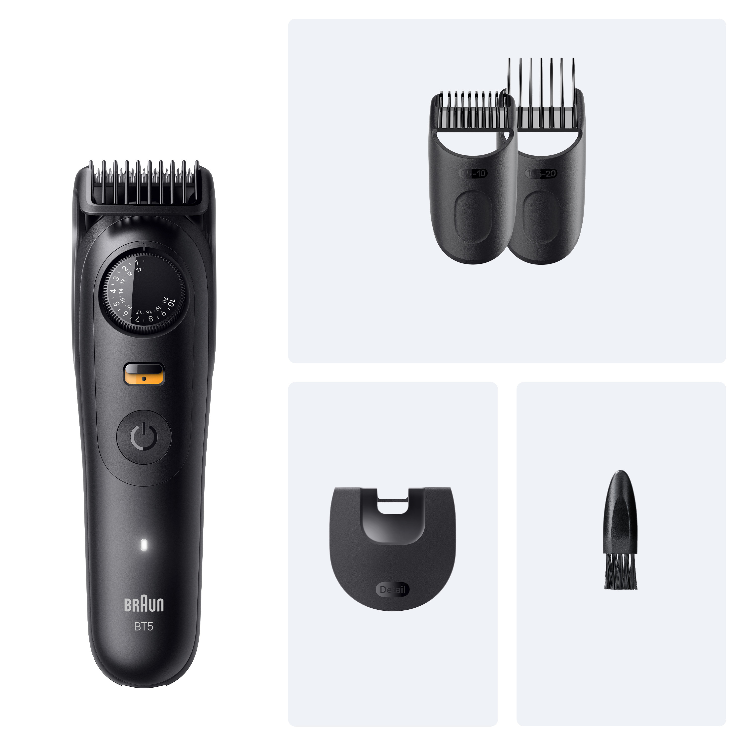 Rasoio elettrico nero con tre accessori.