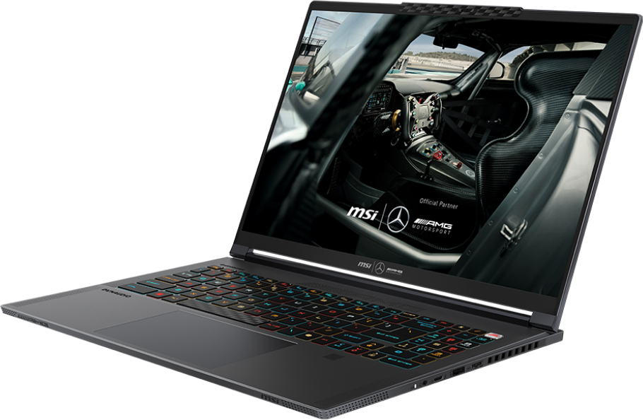 Fekete MSI laptop nyitva. Versenypálya a képernyőn. Világító billentyűzet látható.