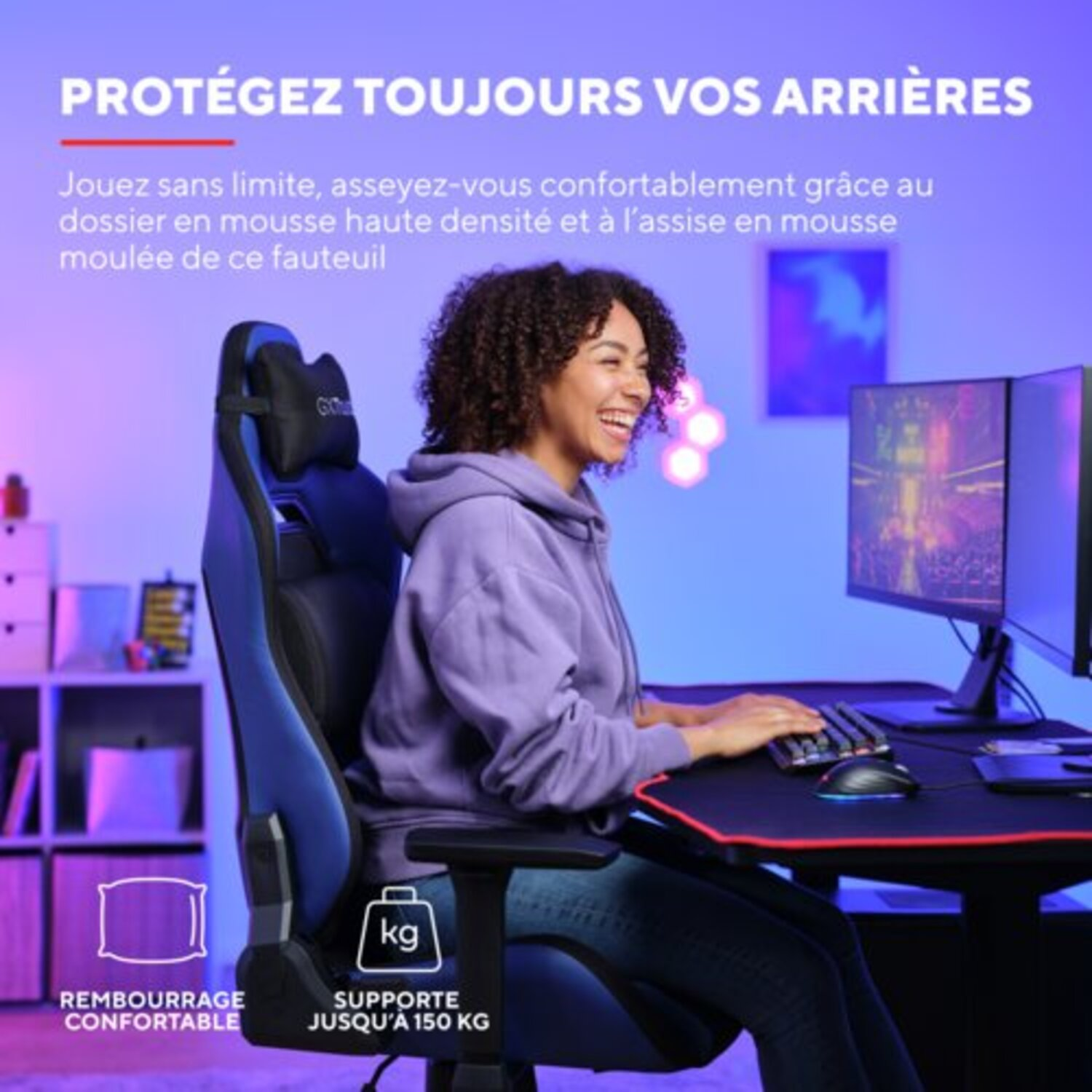 Femme dans un fauteuil de jeu, jouant, regardant un écran de moniteur.