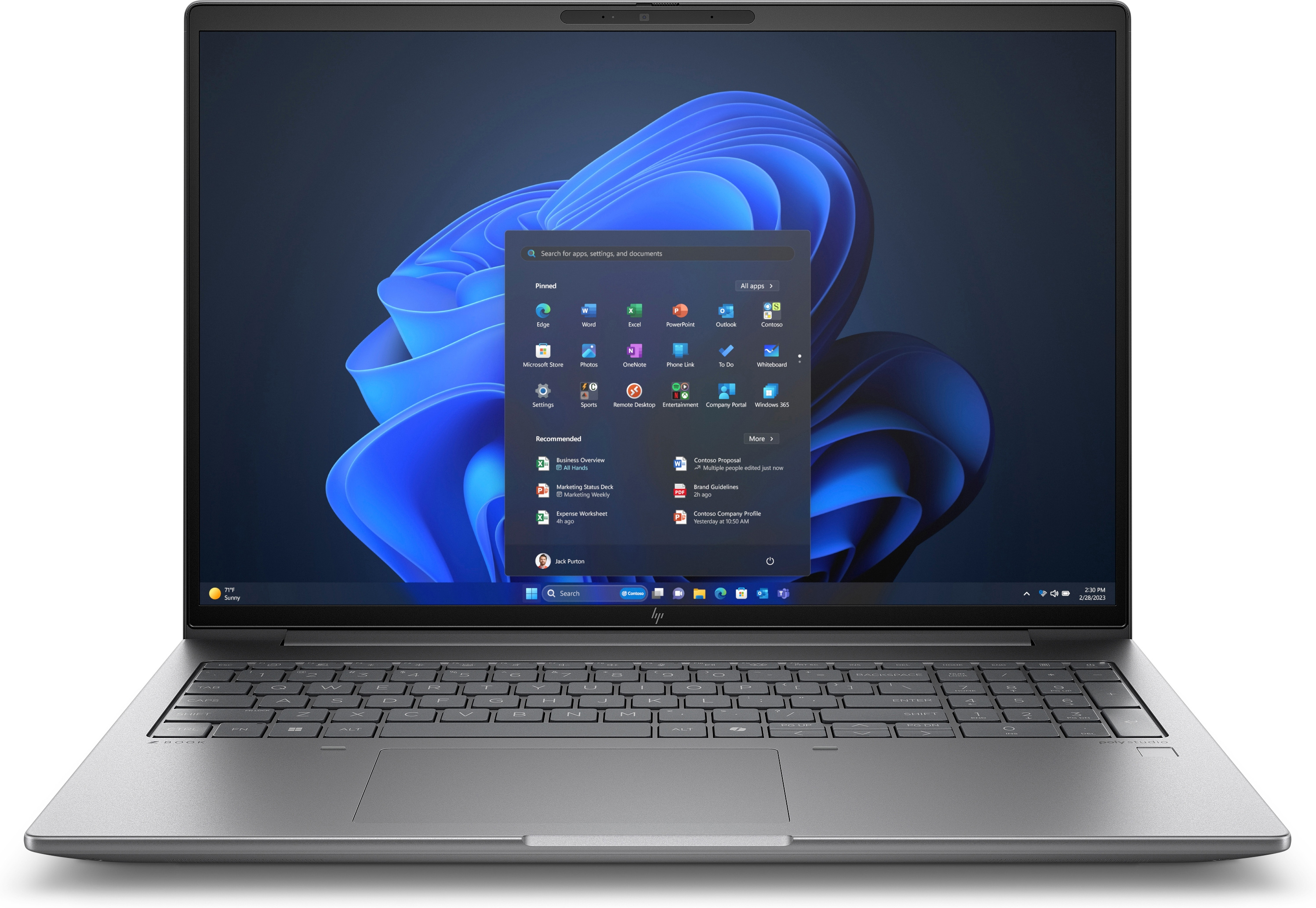 Laptop mit geöffnetem Windows 11 Startmenü. Der Bildschirm zeigt verschiedene App-Symbole und einen dunkelblauen Hintergrund.