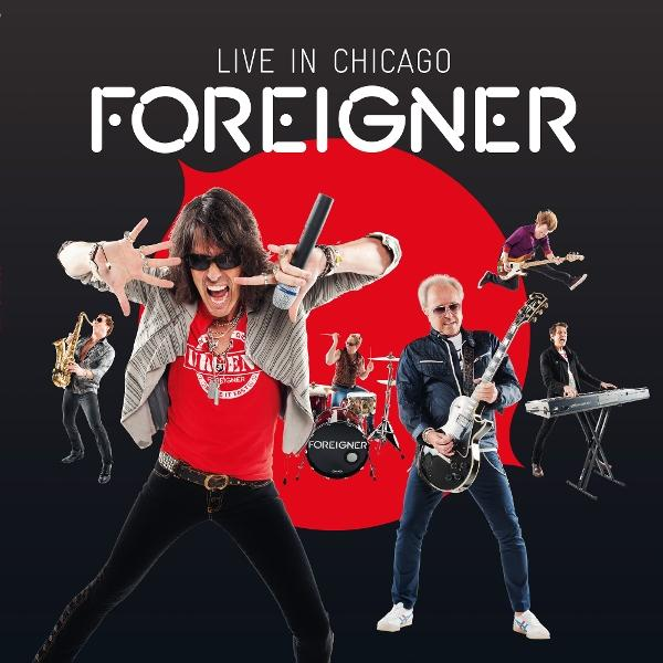 Foreigner 'Live in Chicago' Albumcover. Enthält Bandmitglieder, die auf der Bühne auftreten.