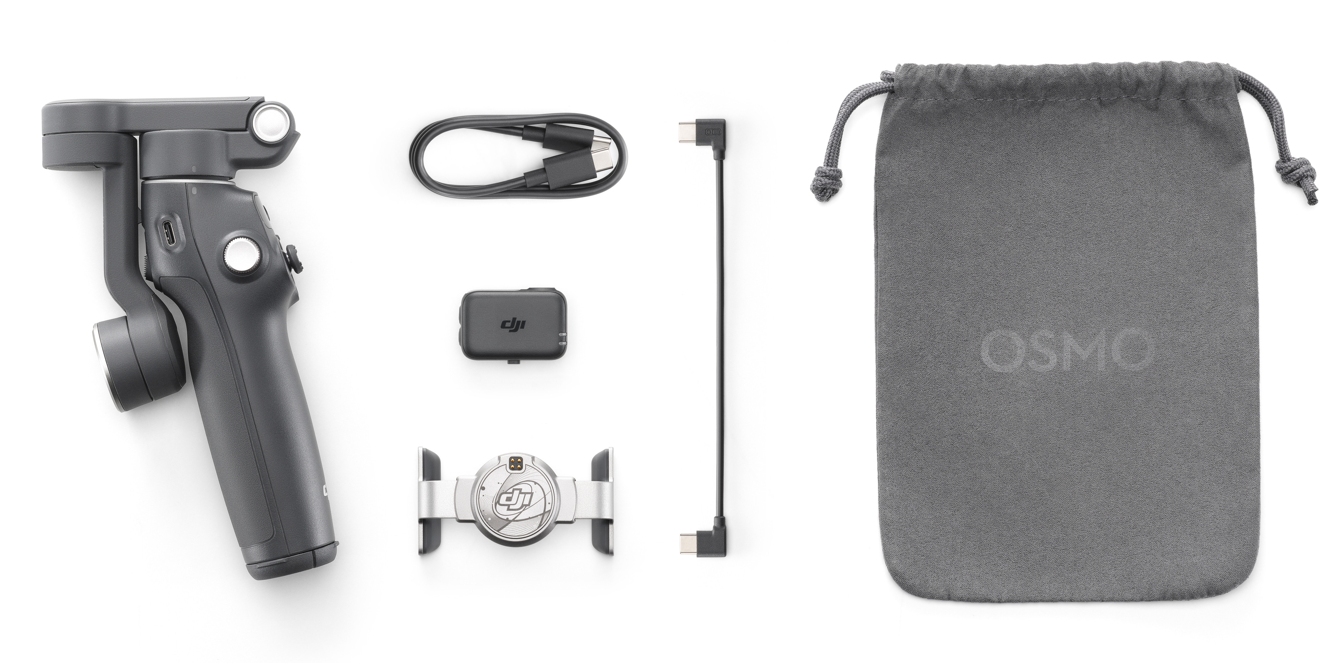 Zestaw urządzeń mobilnych DJI Osmo z akcesoriami na białym tle. Komponenty rozmieszczone.