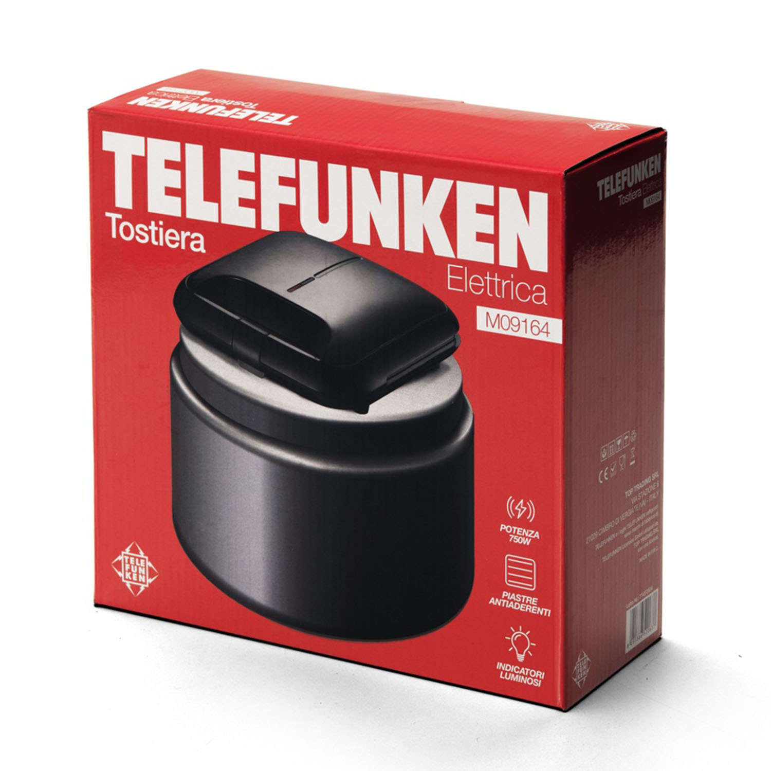 Una scatola per tostapane Telefunken rossa e nera su una superficie bianca.