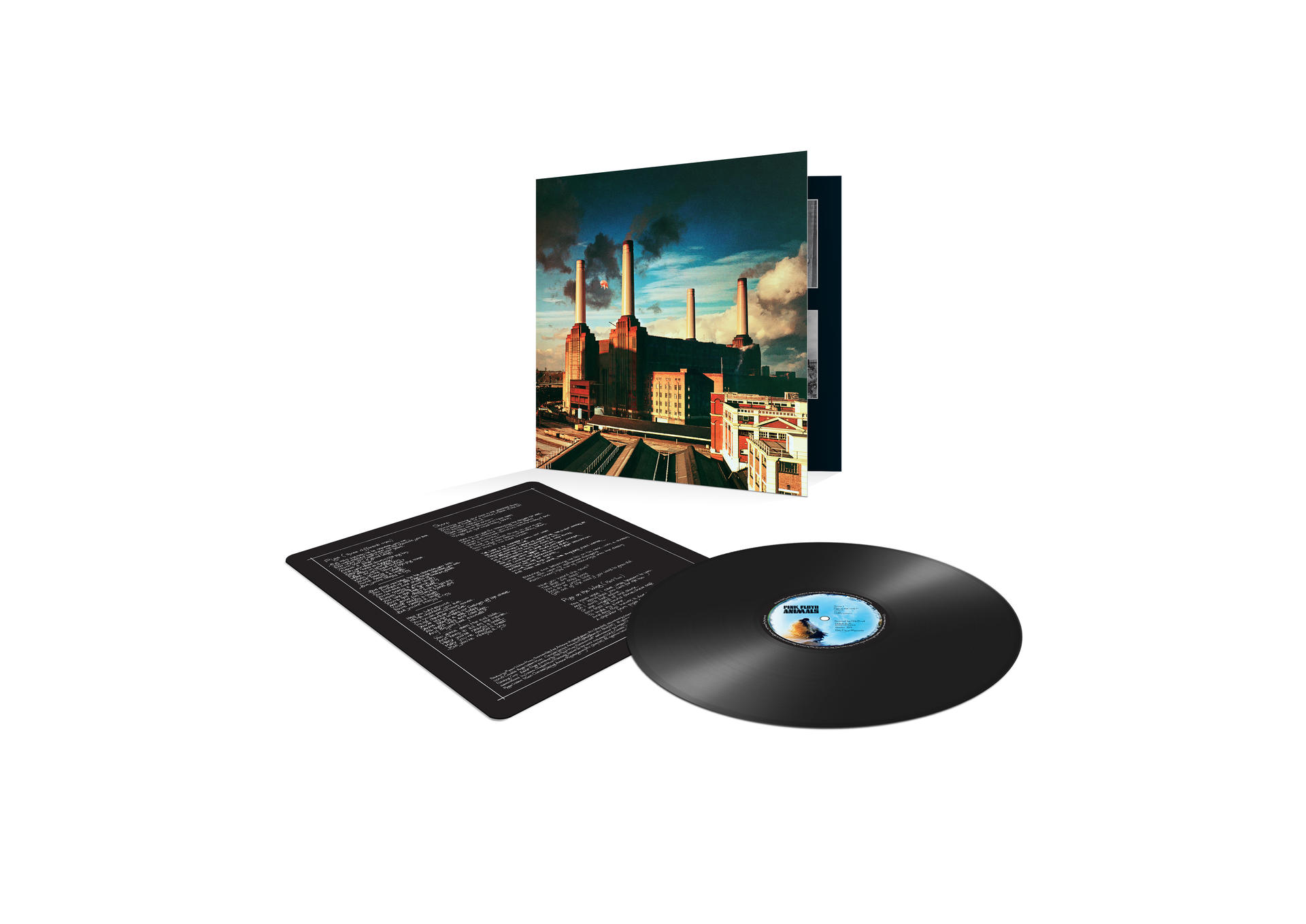 Albumcover von Pink Floyds 'Animals'. Fabrik mit Schornsteinen und einem Schwein.
