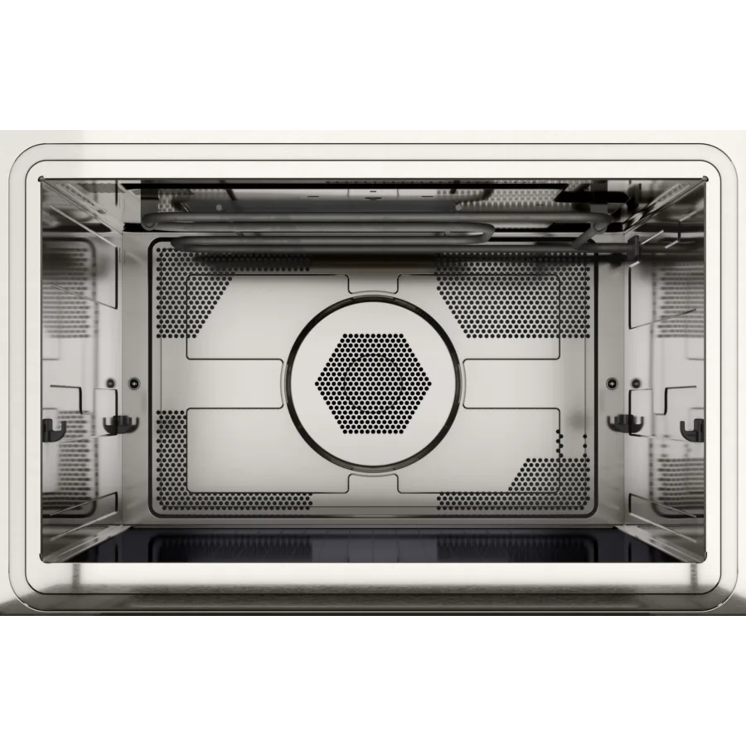 Inside of a silver microwave oven. Hexagon pattern in the middle, metal grates, and a dark interior.