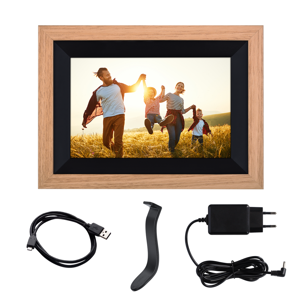 Fotorahmen mit einem Familienfoto. Eine Familie rennt bei Sonnenuntergang auf einem Feld, mit Zubehör darunter.