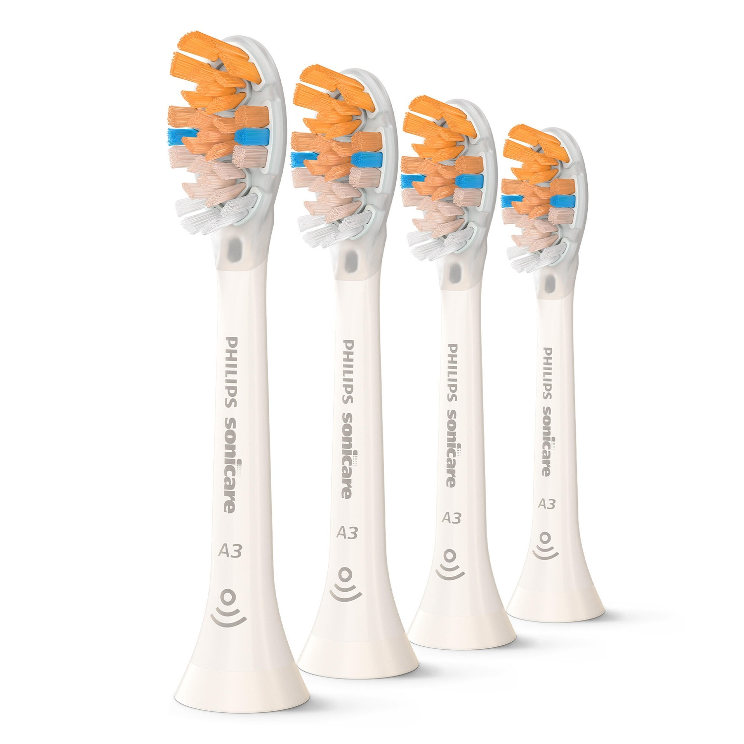 Quatre têtes de brosse à dents blanches, poils colorés.