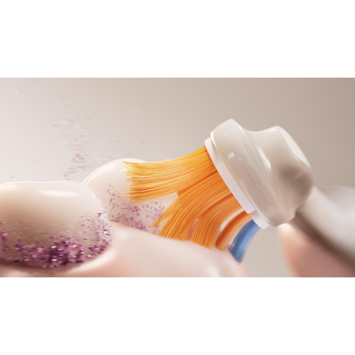 Brosse à dents nettoyant les dents. Soies oranges, mousse rose et particules violettes. Hygiène dentaire.