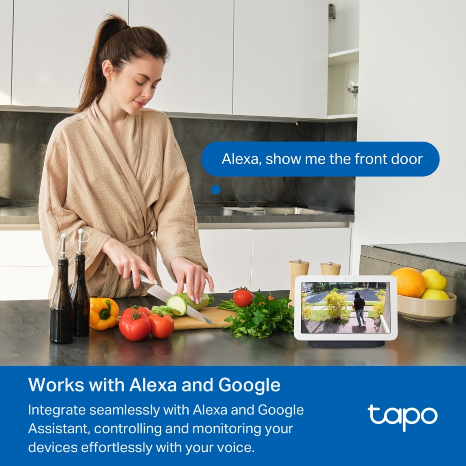 Woman cutting vegetables at a counter. A tablet shows a front door view.