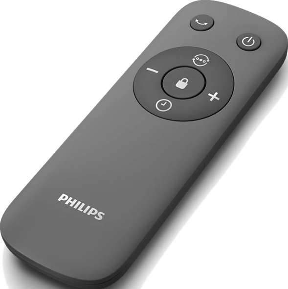 Une télécommande Philips gris foncé avec plusieurs boutons, sur fond noir.