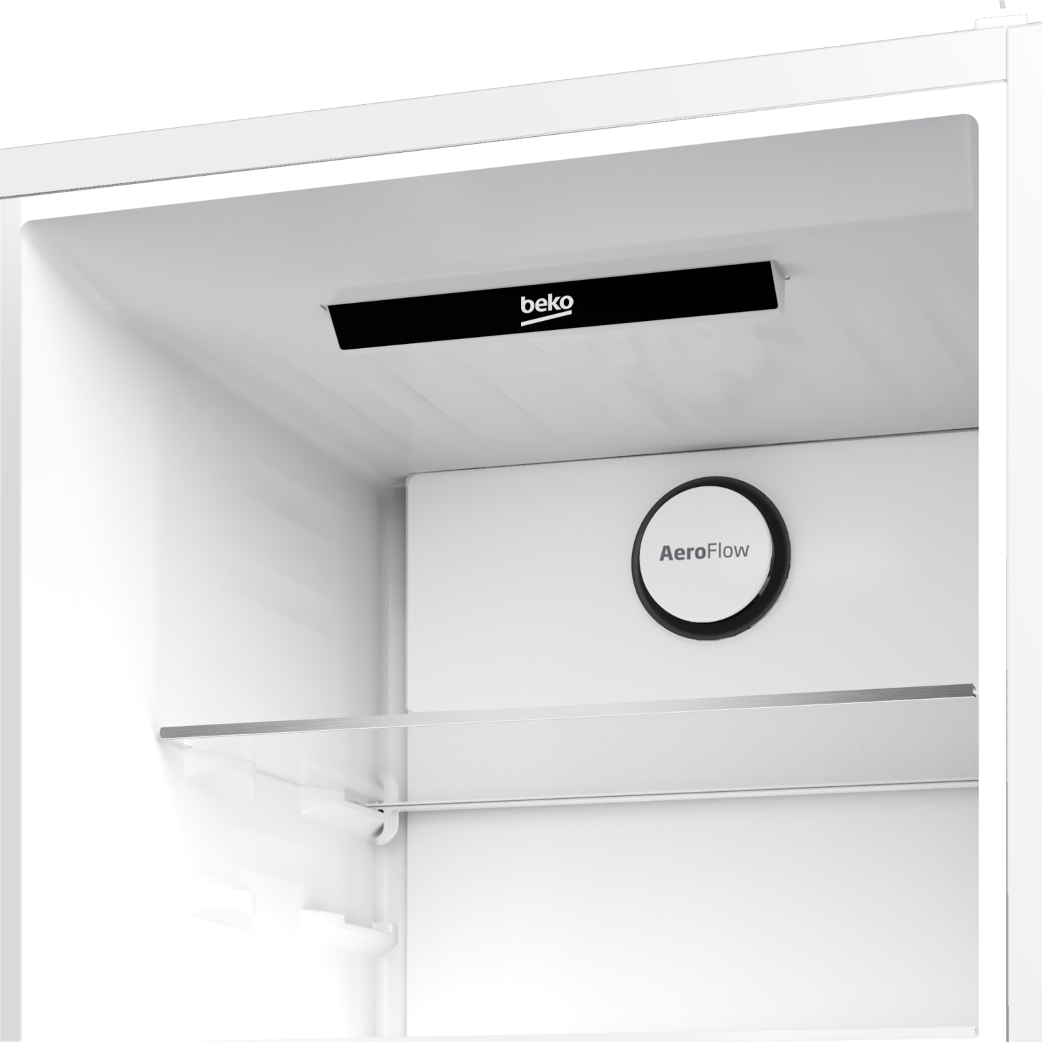 Inside Beko fridge. AeroFlow system, Beko logo. Glass shelves visible.