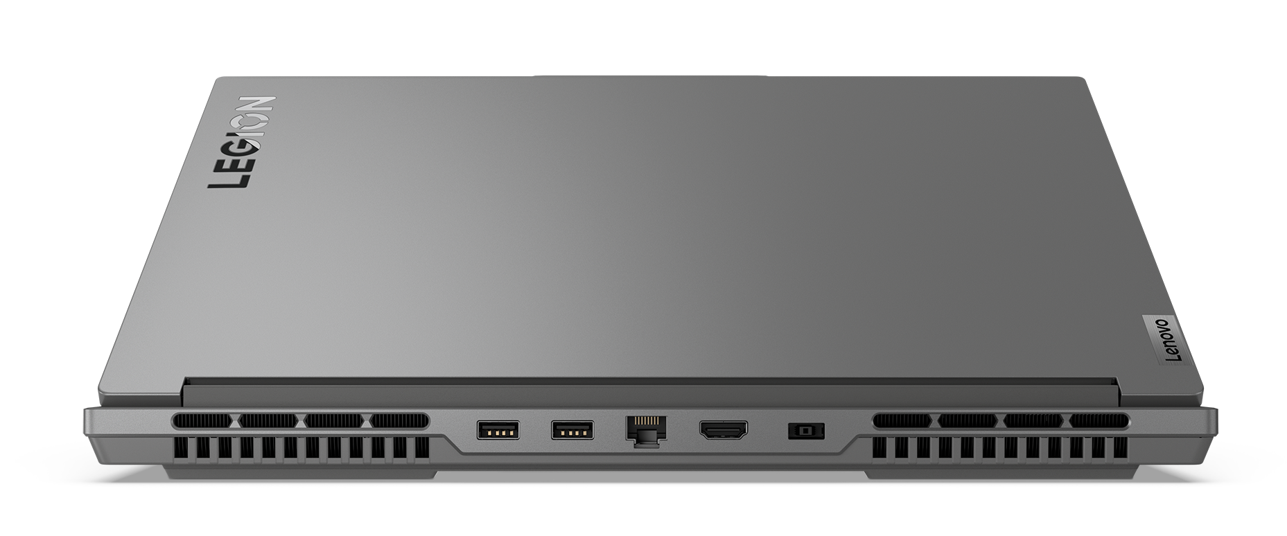 Widok z góry na szary laptop ze słowem 'LEGION' na górze. Czarne tło.