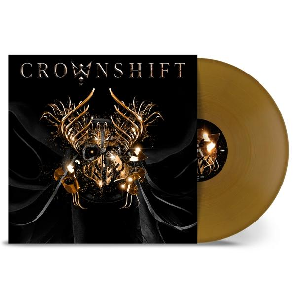 Vinyl lemez arany-fekete dizájnnal, fehér háttér előtt.