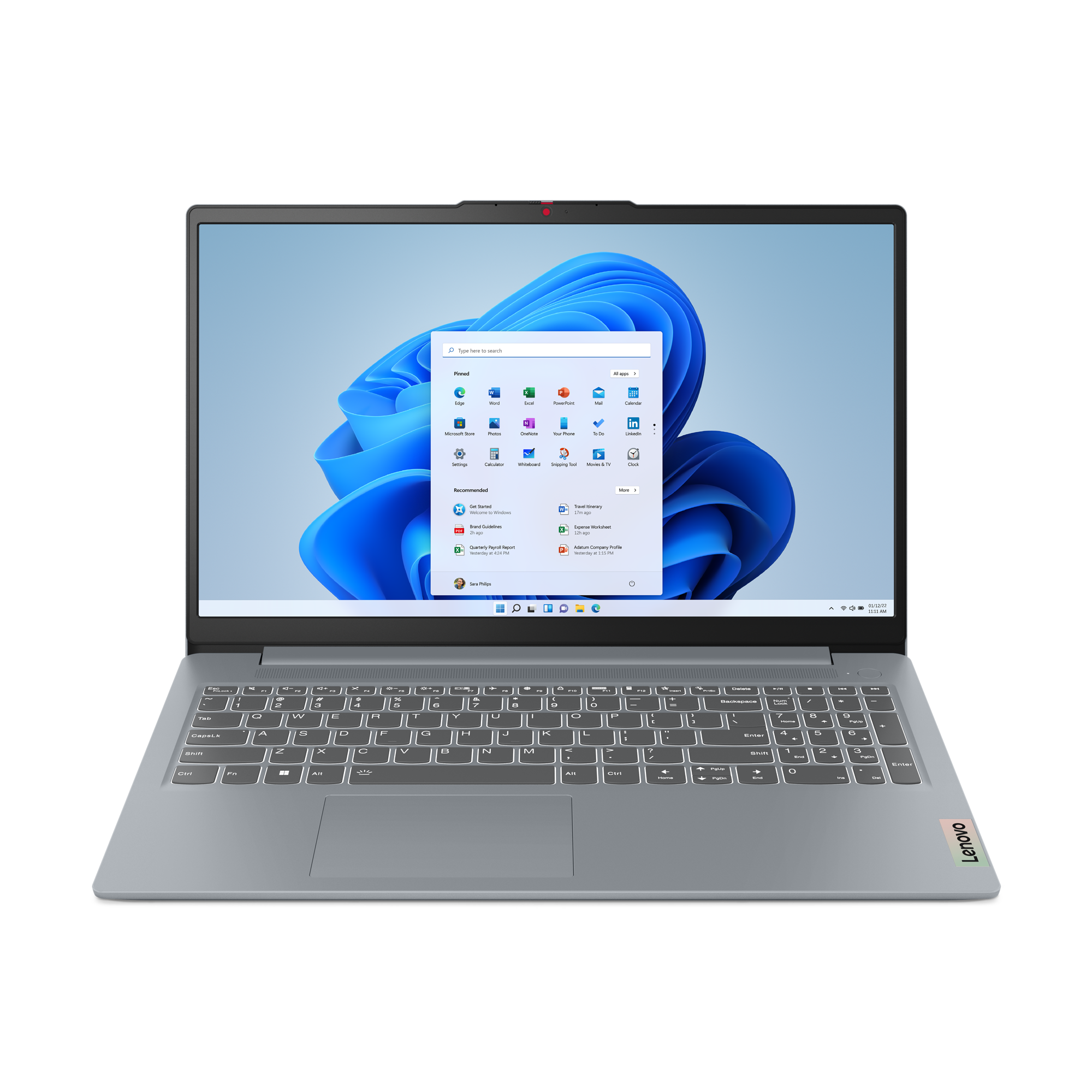 Siyah arka planda gümüş dizüstü bilgisayar. Windows 11 ekranı. Klavye ve dokunmatik yüzey görülebilir. Sağda Lenovo logosu.