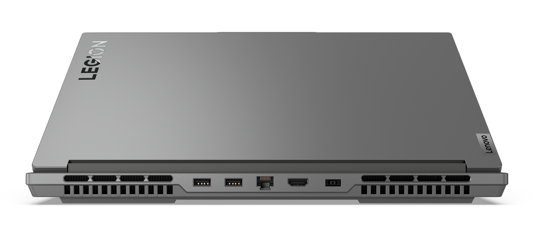 Laptop z logo Lenovo Legion z tyłu, pokazujący porty i wentylację, na czarnej powierzchni.