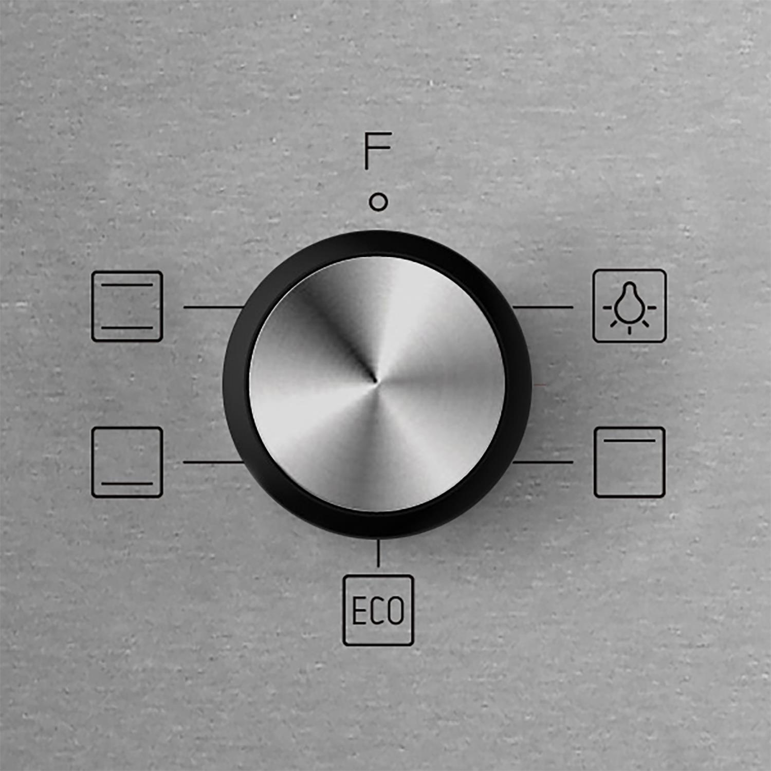 Primo piano di un quadrante metallico con anello nero. Icone e lettere: F, ECO, e una lampadina.