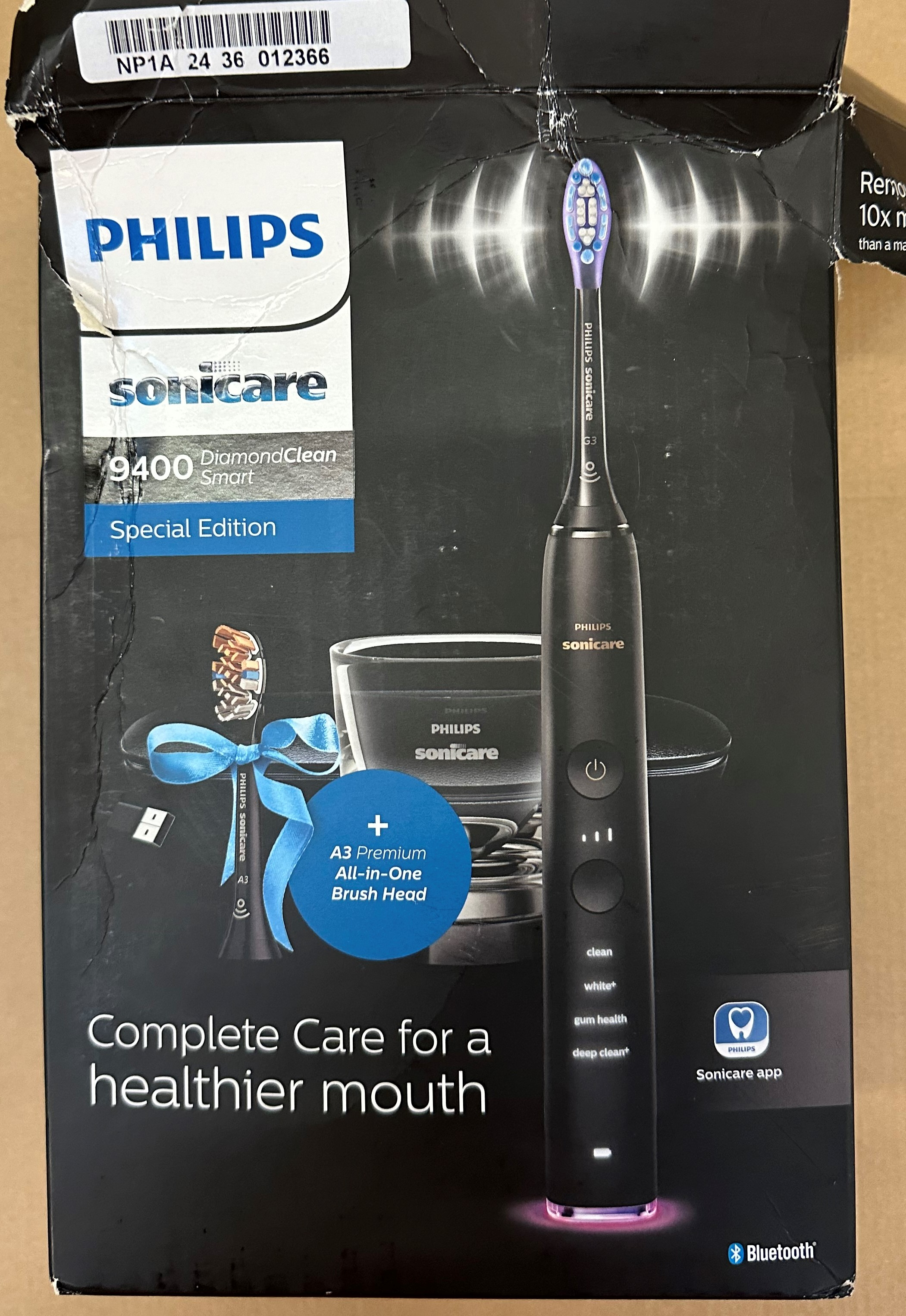 Opakowanie czarnej szczoteczki sonicznej Philips Sonicare z akcesoriami.