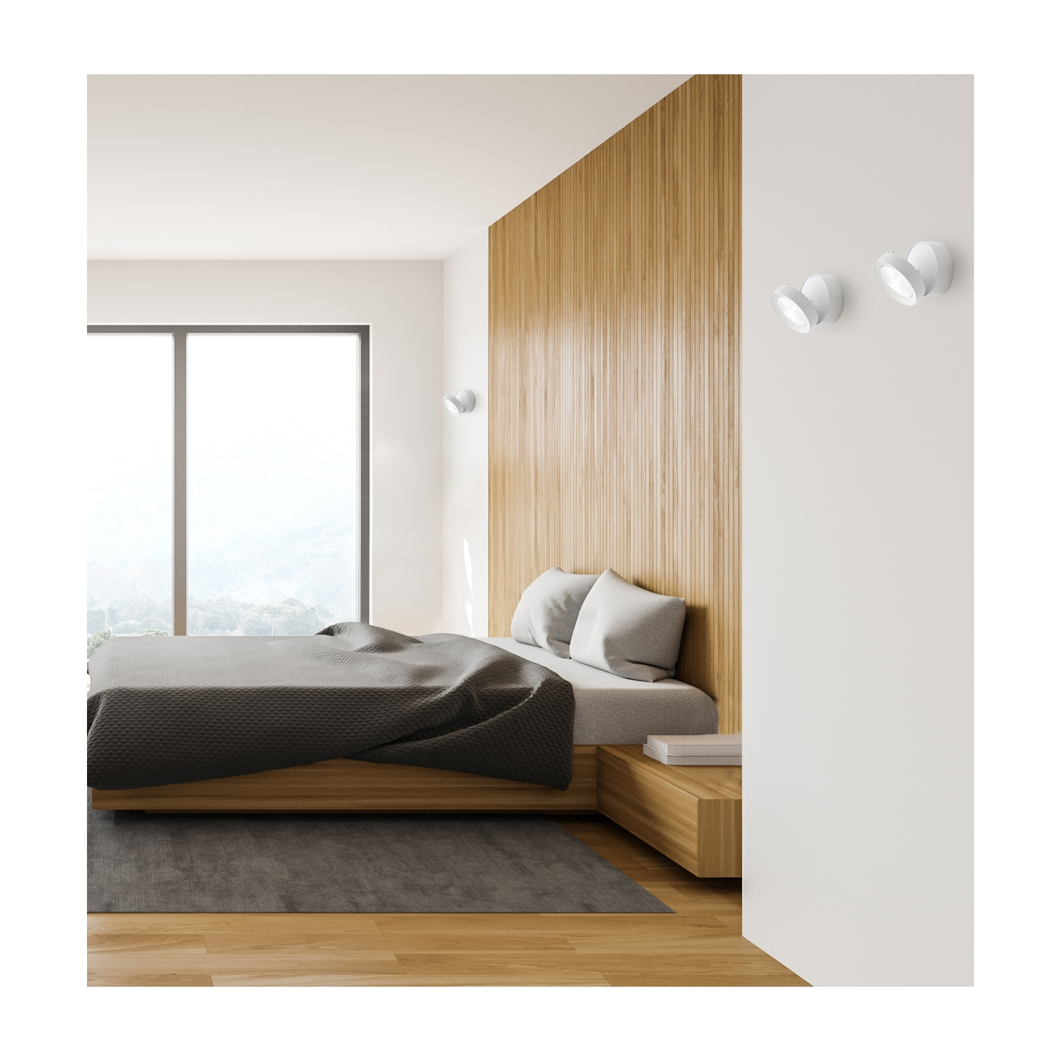 Camera da letto con letto, parete in legno e tre faretti bianchi sul muro.