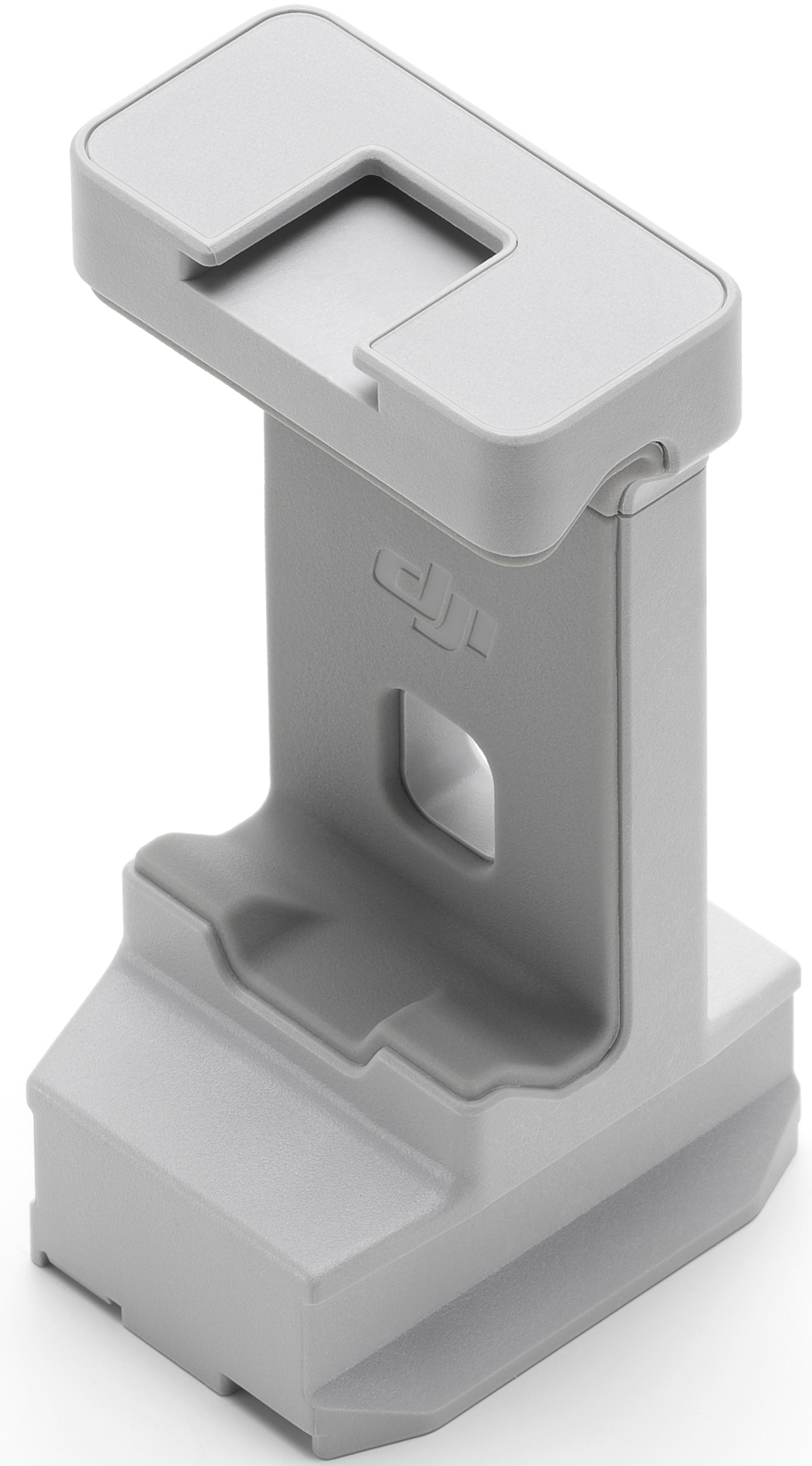 Un appareil DJI gris clair pour le chargement. Il se tient debout avec une base rectangulaire.