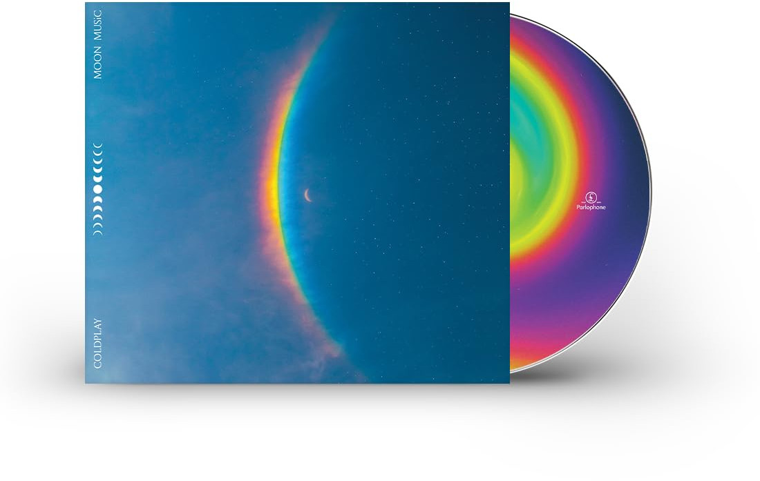 CD album borító. Kék égbolt és szivárvány szöveggel. Fehér háttér.
