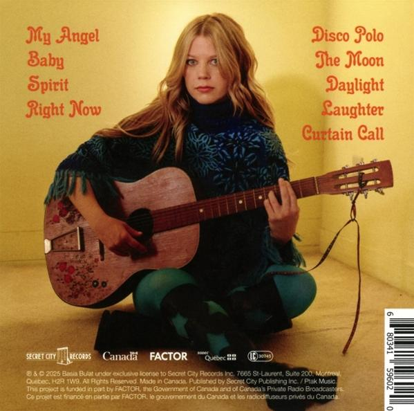 Frau mit Gitarre auf Albumcover. Text enthält Songtitel und Credits. Grüne und blaue Kleidung.