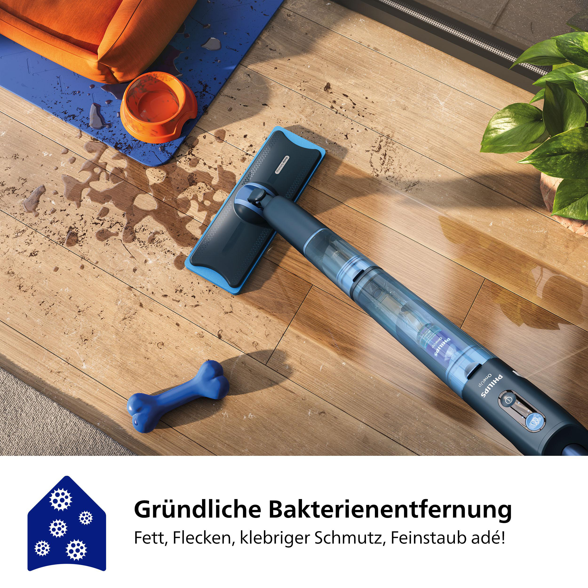 Ein Bodenreiniger mit einem blauen Pad und einem blauen Hundespielzeug.
