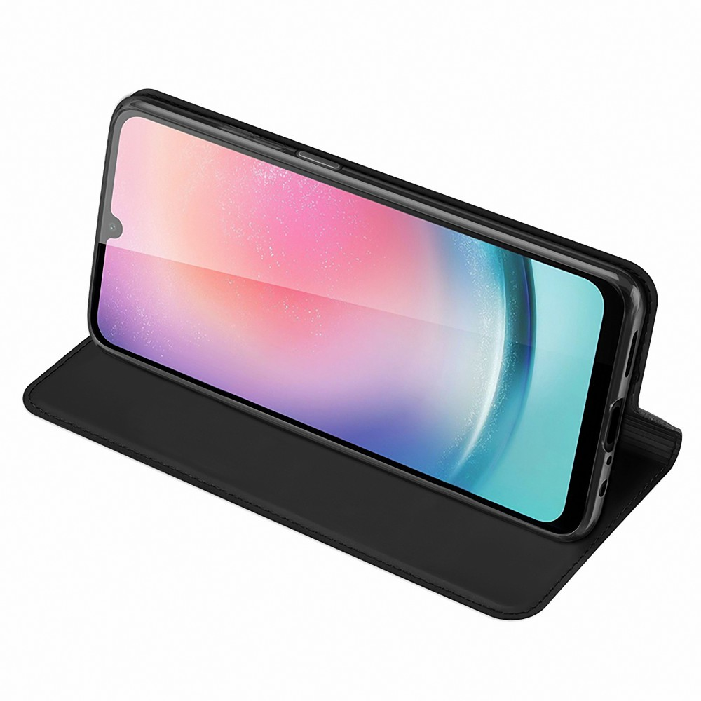Fekete telefon fekete tokban. A képernyő színes hátteret jelenít meg.