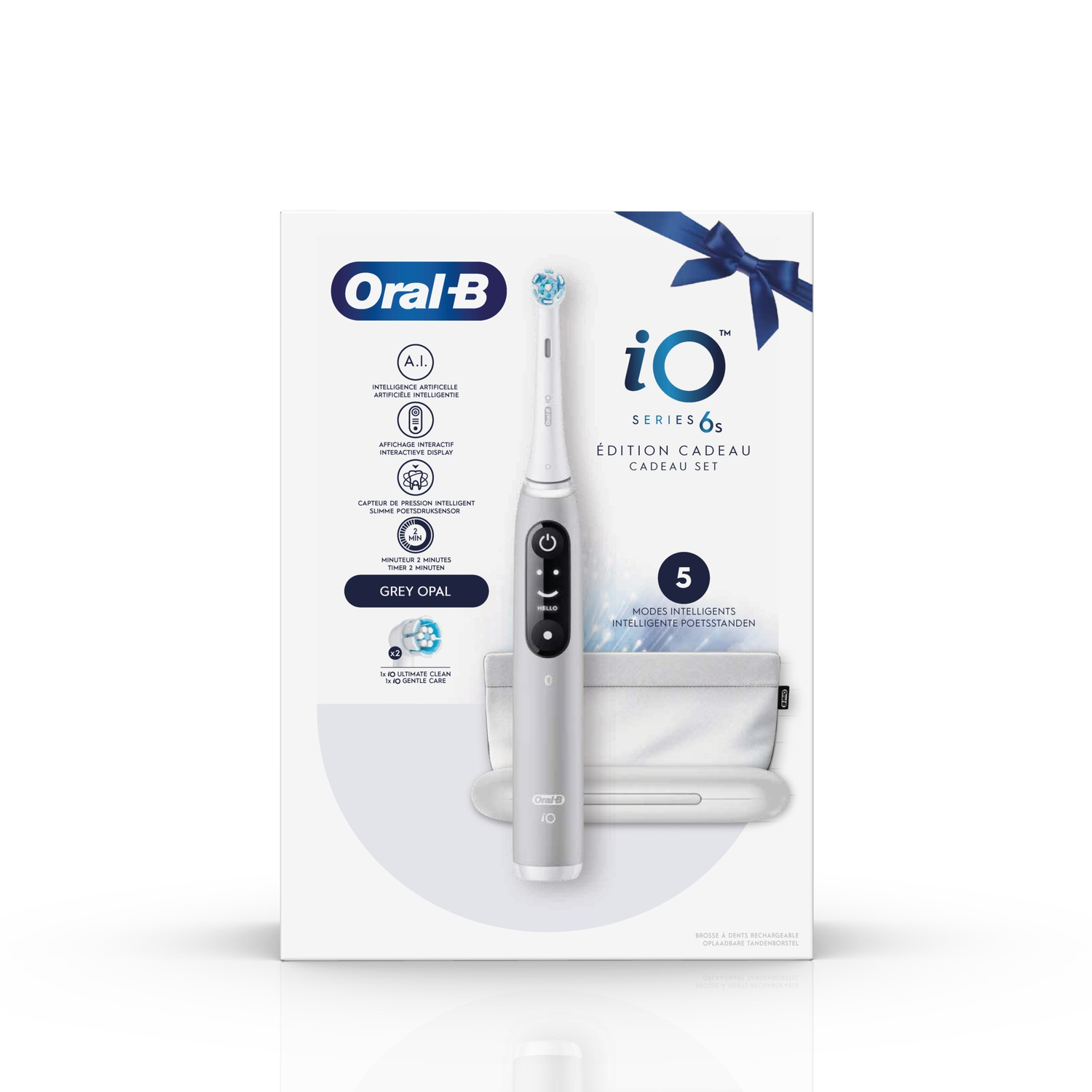 Oral-B iO Series 6s electric toothbrush gift set. White box, gray toothbrush, white charger, and travel case.