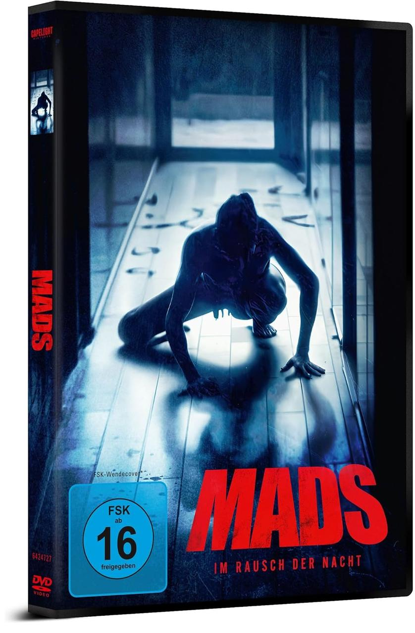 DVD-Hülle mit einer kauernden Figur. Roter Titel "MADS" und deutscher Text.