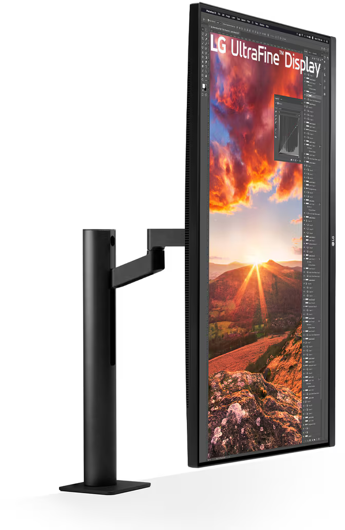 LG UltraFine kijelző. Egy magas monitor állvánnyal, színes képet mutat a képernyőn.