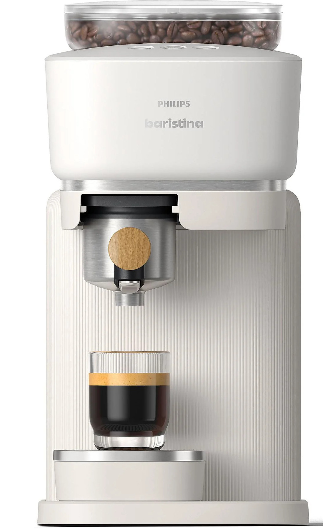 Biały ekspres do kawy Philips Baristina ze szklanką espresso pod wylewką.