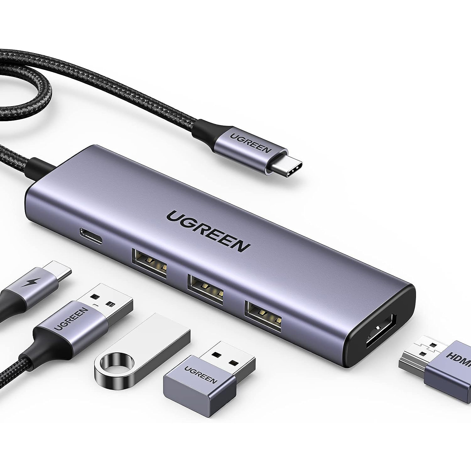 Çeşitli konektörlere ve bağlı USB cihazlarına sahip gri bir USB hub, beyaz arka plan.