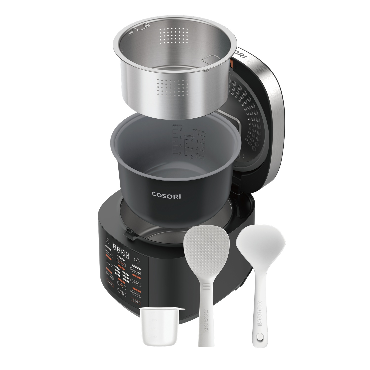 Rice cooker disassembled, showing inner pot, outer pot, and accessories like spoon and cup.