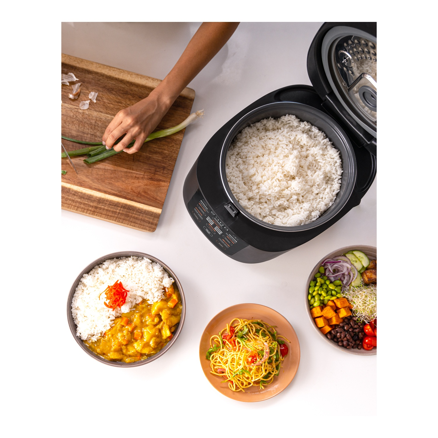 Rice cooker with dishes.