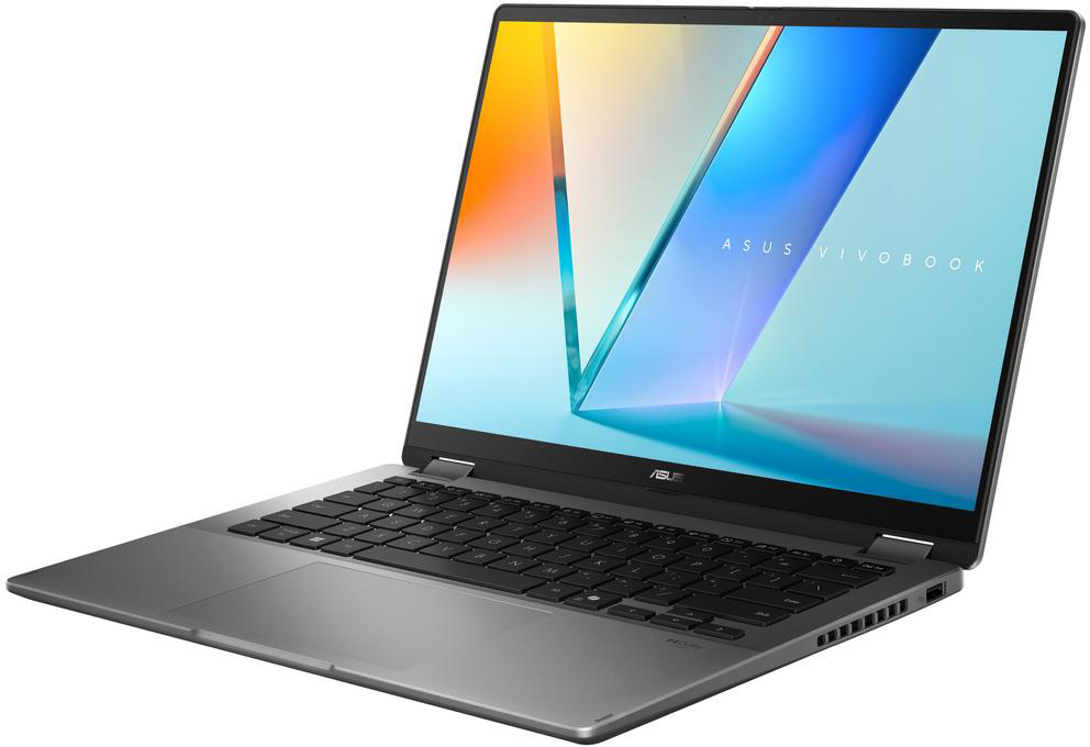 Egy laptop ezüst testtel és fekete billentyűzettel. A képernyő nyitva van, és színes képet mutat.