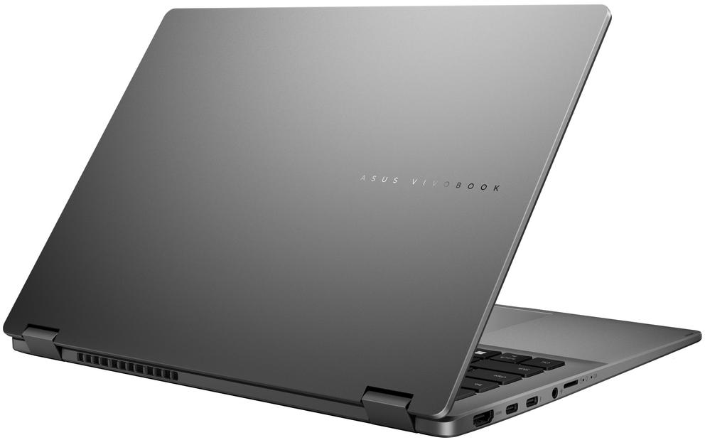Egy zárt, szürke laptop, amelynek hátsó fedelén látható az ASUS Vivobook logó, kissé nyitva.