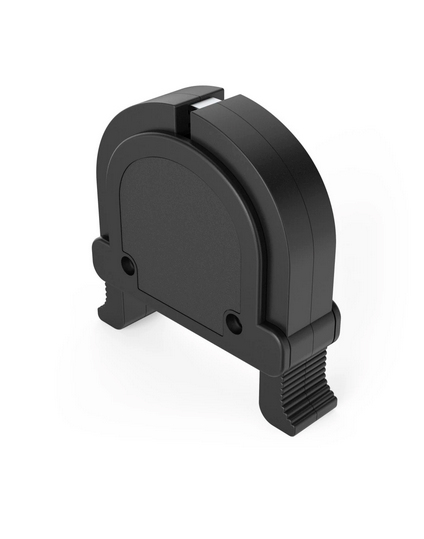 Objeto de plástico negro, posiblemente una herramienta, con forma curva y bisagra.
