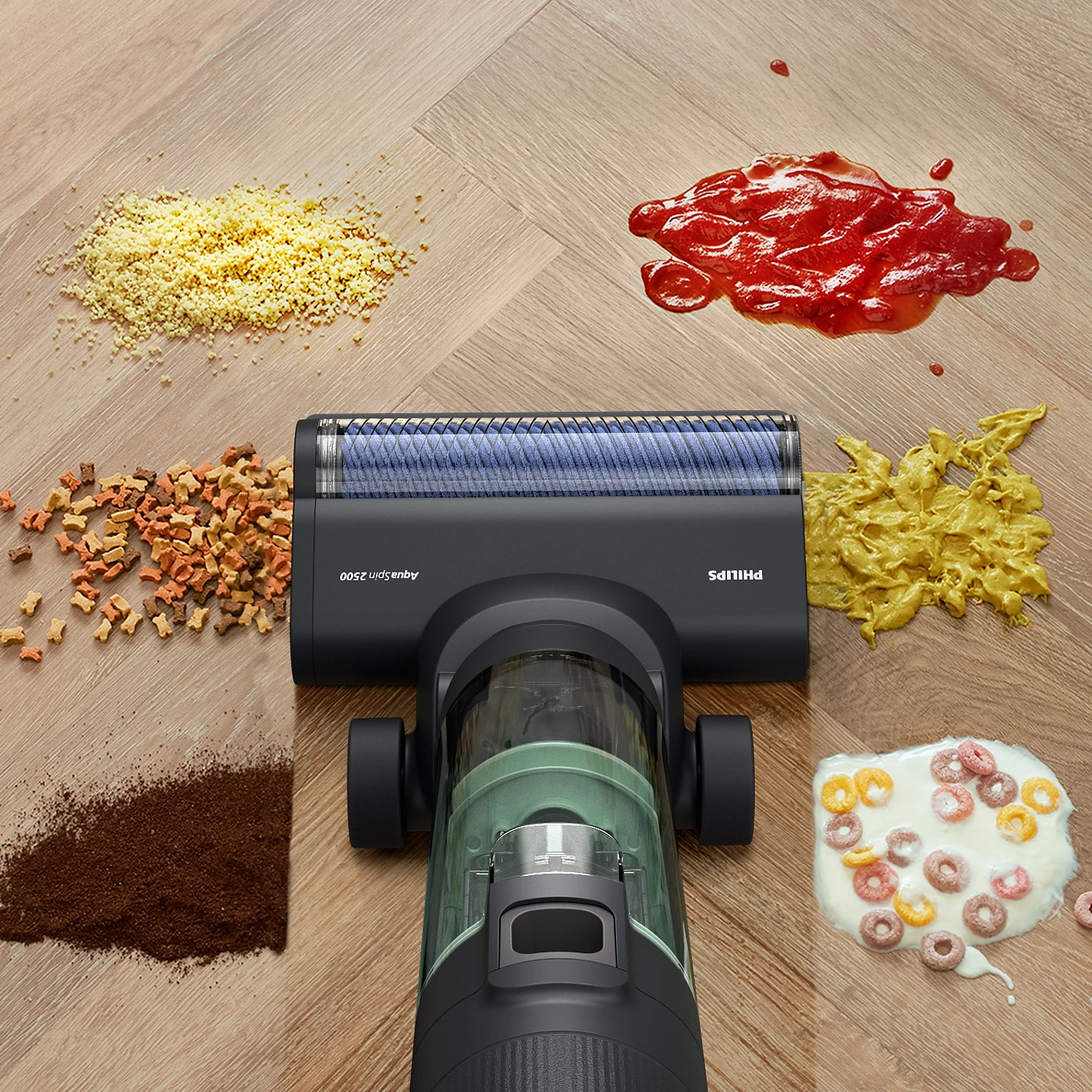 Aspirateur nettoyant des aliments. Les aliments comprennent des miettes, des céréales, de la sauce et autres.