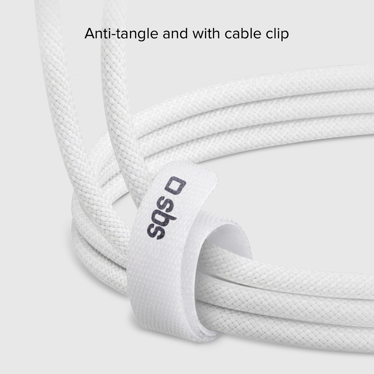 Close-up of white braided cable with an attached white tab that says 'sqs'.