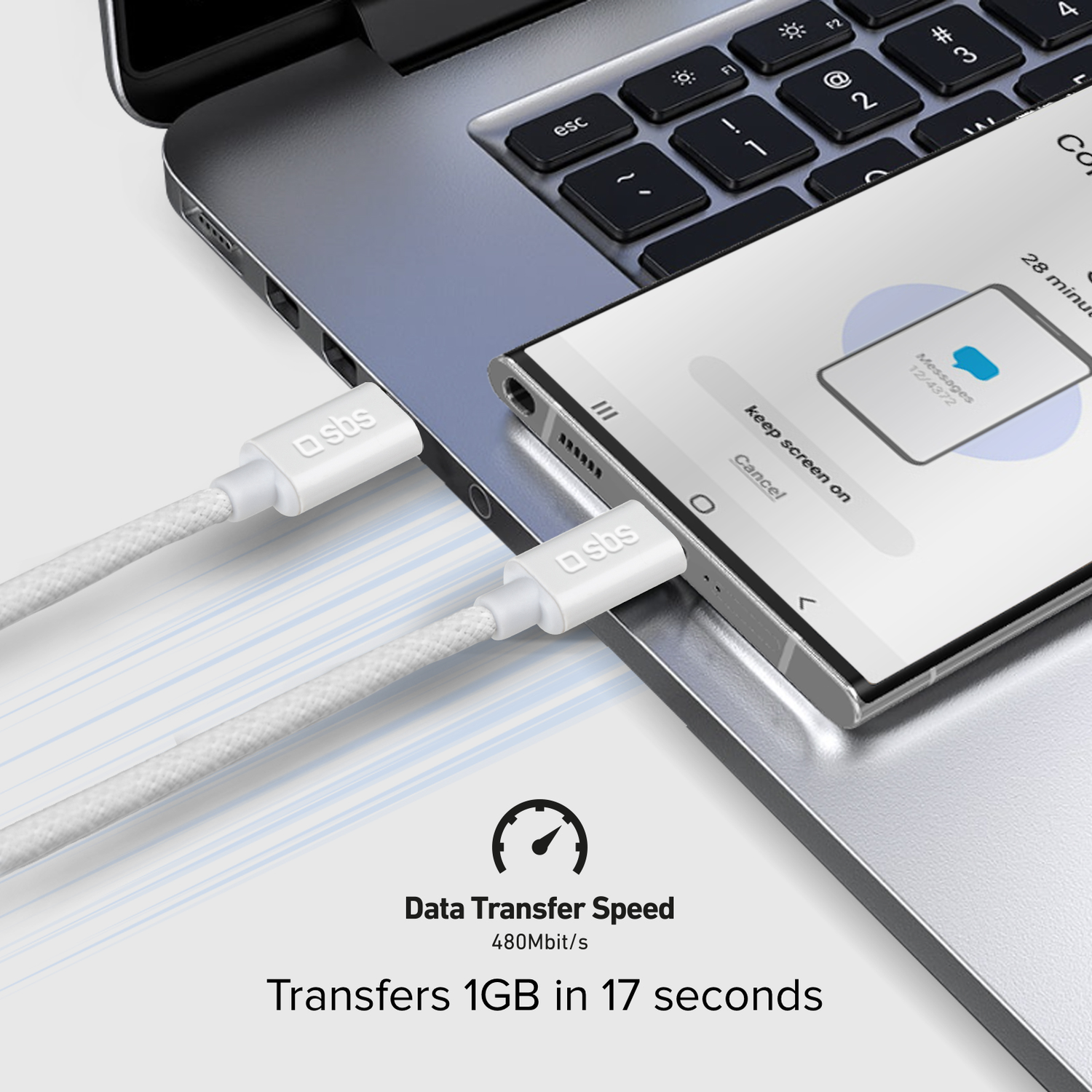 Laptop with phone connected via USB cables. Data transfer speed and time are displayed.