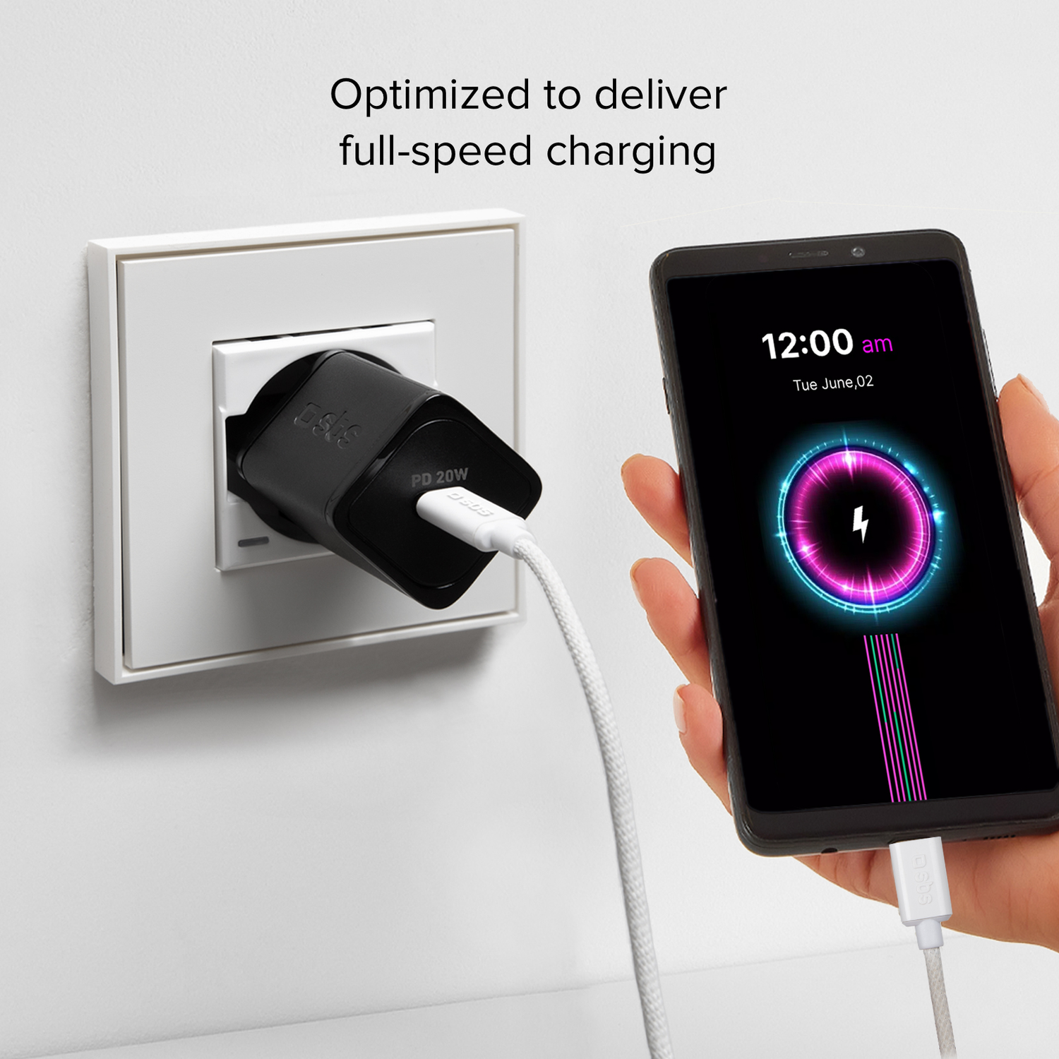 Phone charging, black charger plugged into wall socket.