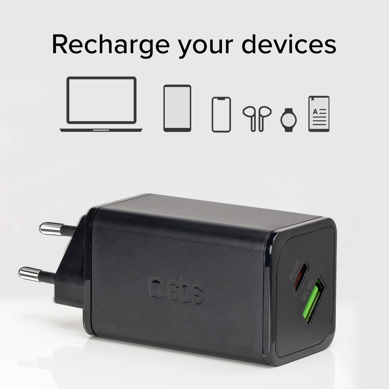 A black charger with two ports and a logo. It is on a white surface. There are icons above it.