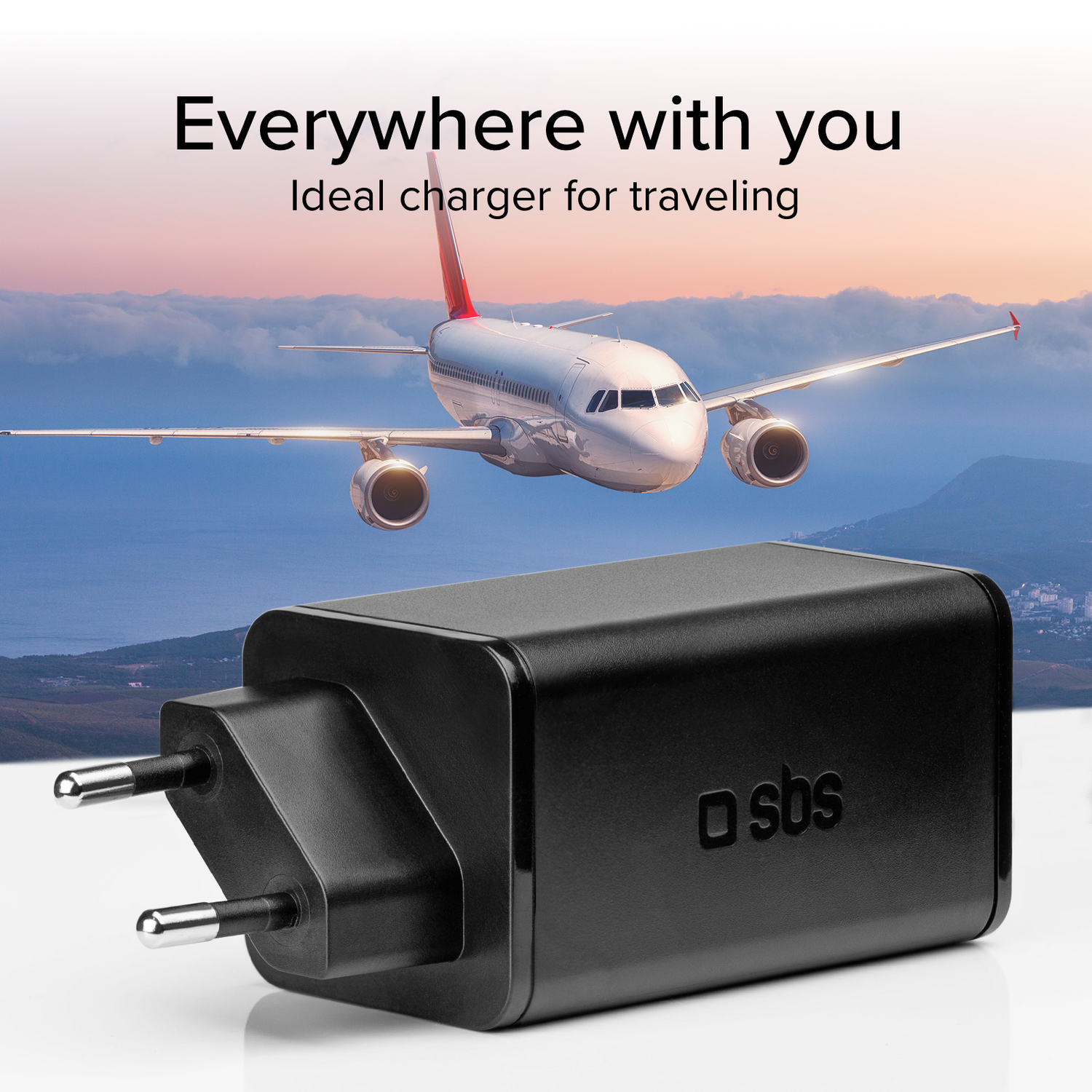 Black charger and airplane in the background. Text says 'Ideal charger for traveling' and 'Everywhere with you'.