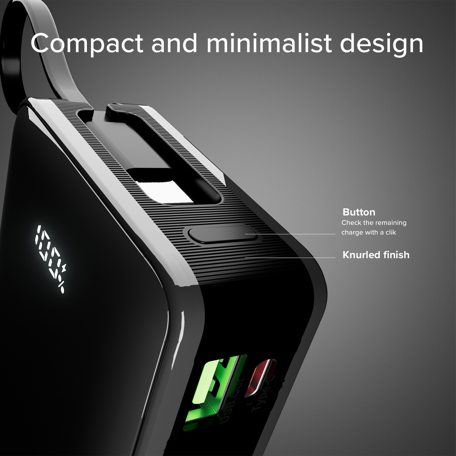 Close-up of a black power bank with a screen showing 100%. Button and USB ports are visible.