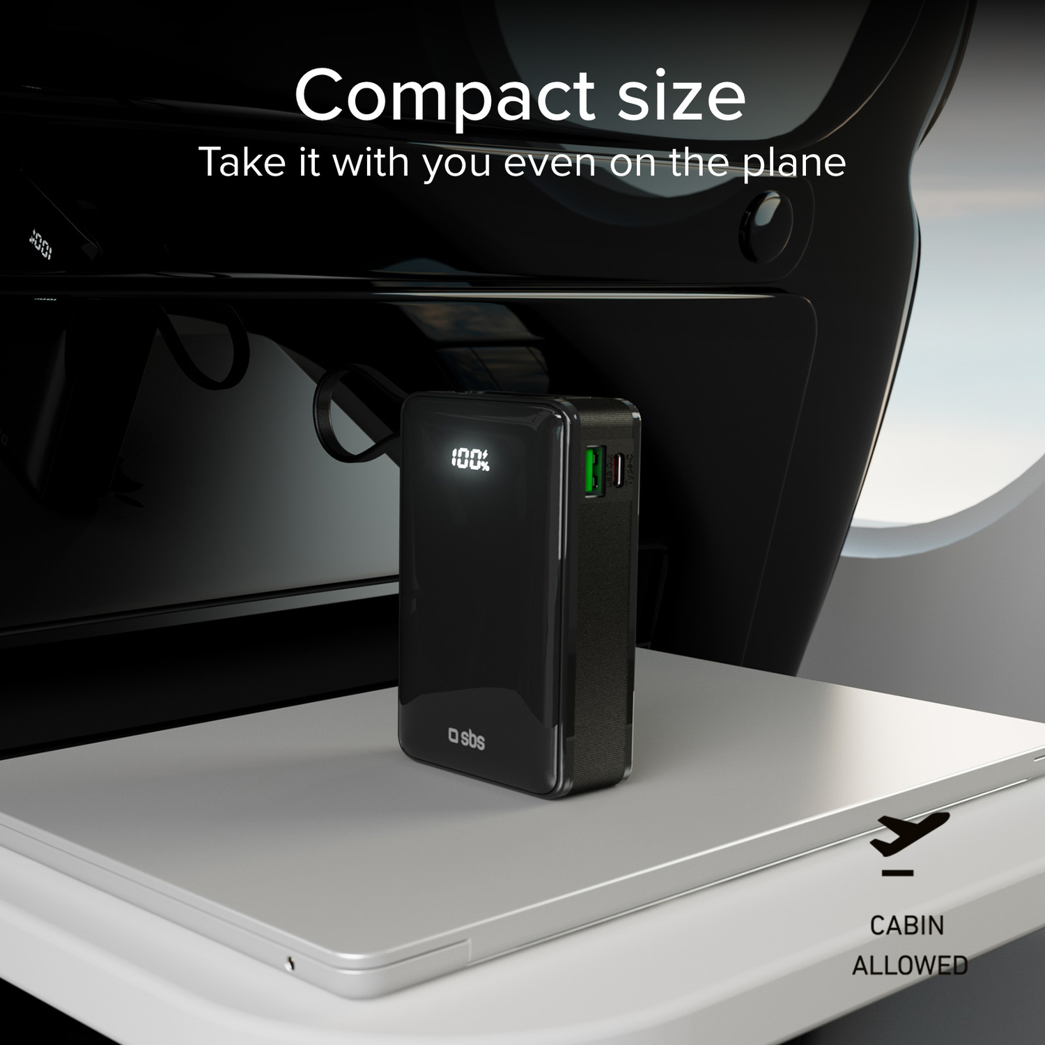 A black power bank on a white surface with cabin allowed text and a plane icon.