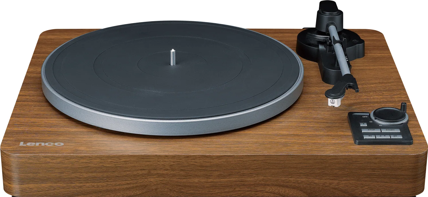 Une platine vinyle avec un disque gris foncé, un bord argenté et une base en bois. Le bras est noir.