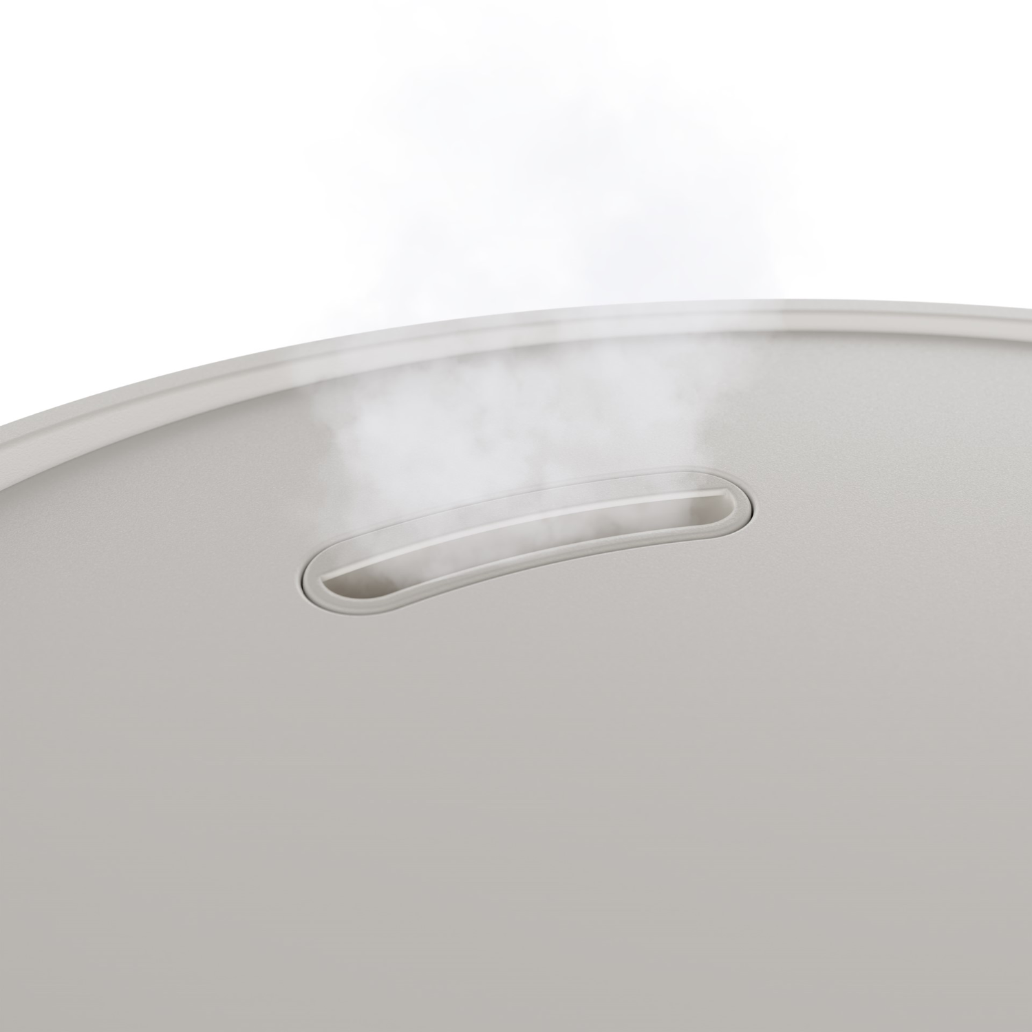 Close-up of a white appliance with steam coming out of a vent.