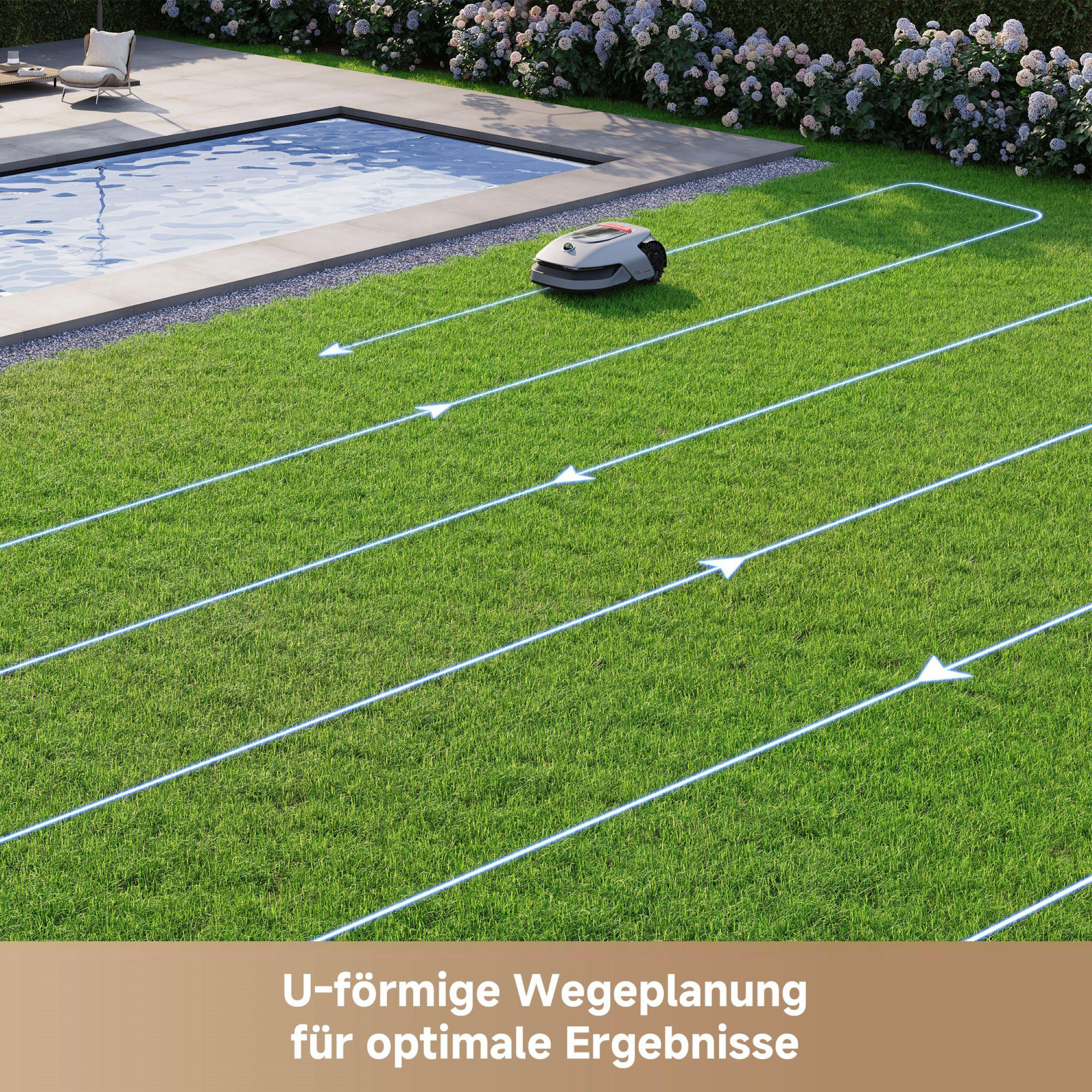 Ein Rasenmäher auf einem grünen Rasen mit einem U-förmigen geplanten Pfad.